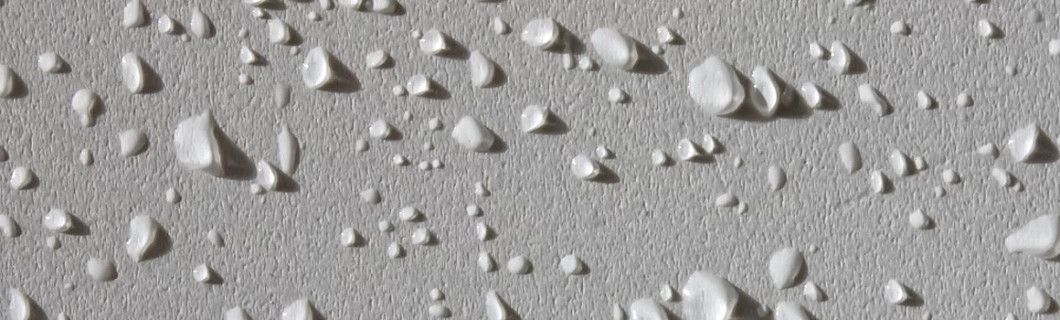 Waterdruppels op geïmpregneerde pleister